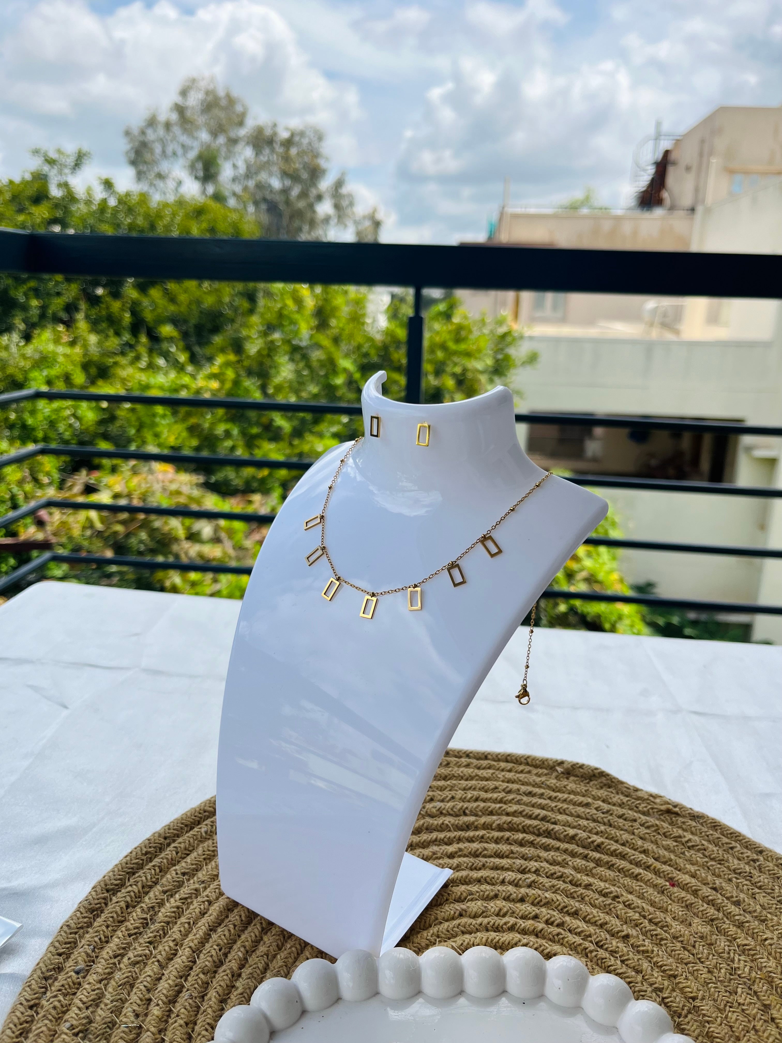 Golden frame charm necklace set